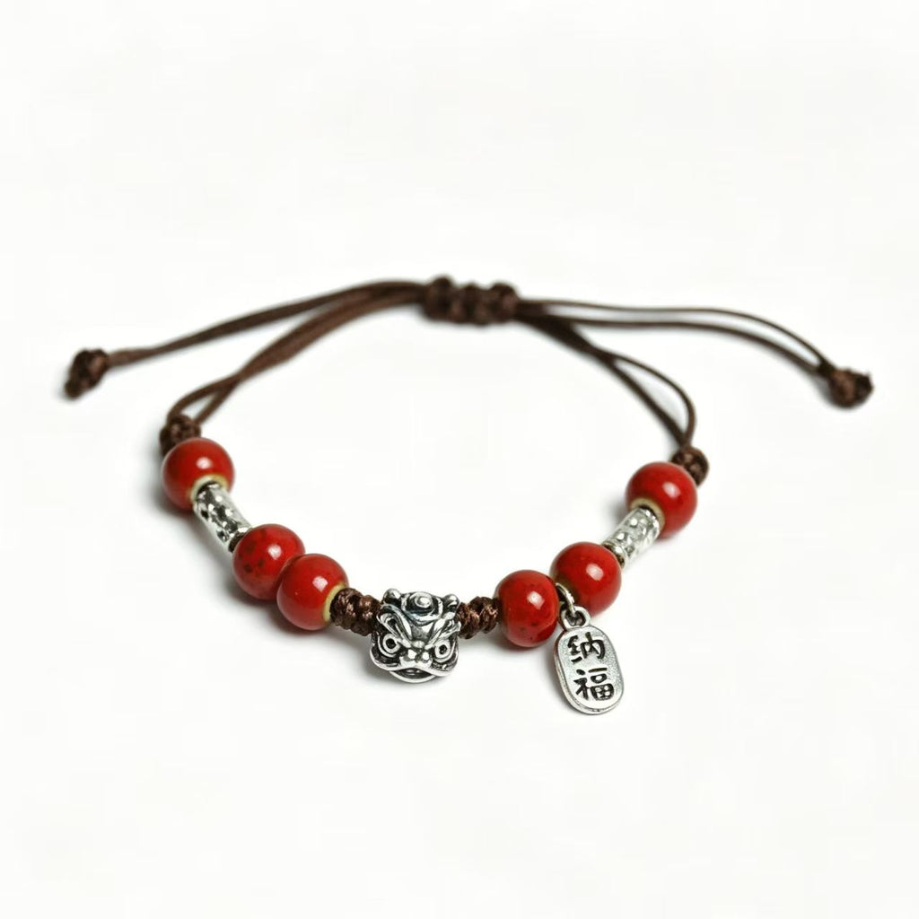 Cinnabar Red Bead Bracelet with Silver Lucky Charms