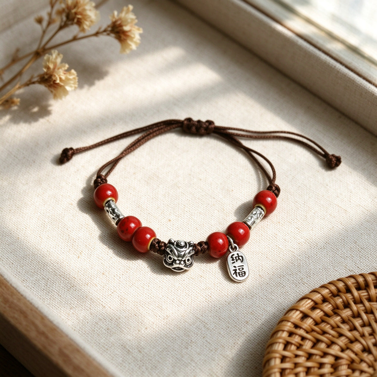 Cinnabar Red Bead Bracelet with Silver Lucky Charms